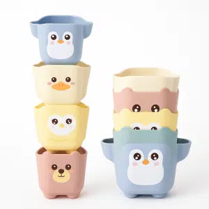 Sæt af 5 pastelfarvede, stablebare kopper med dyreansigter – pingvin, and, ugle, abe, bjørn