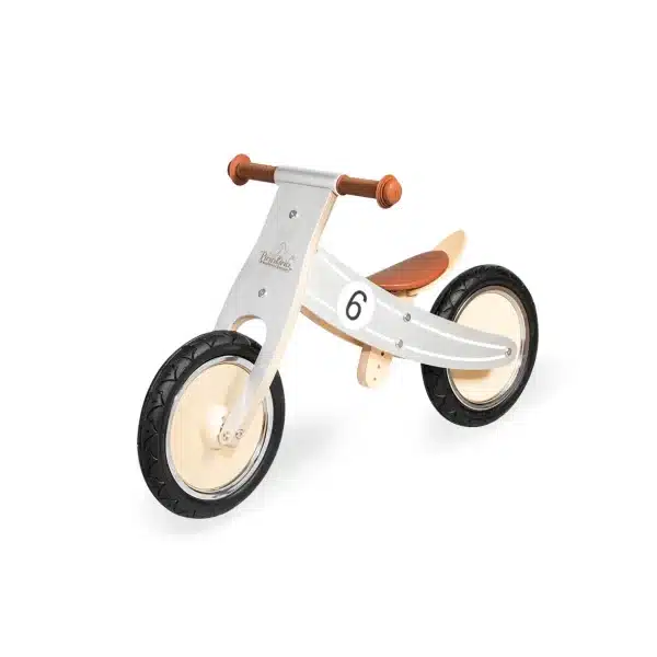 Pinolino Nico løbecykel i sølv/natur med lav sadelindstilling og brune detaljer.